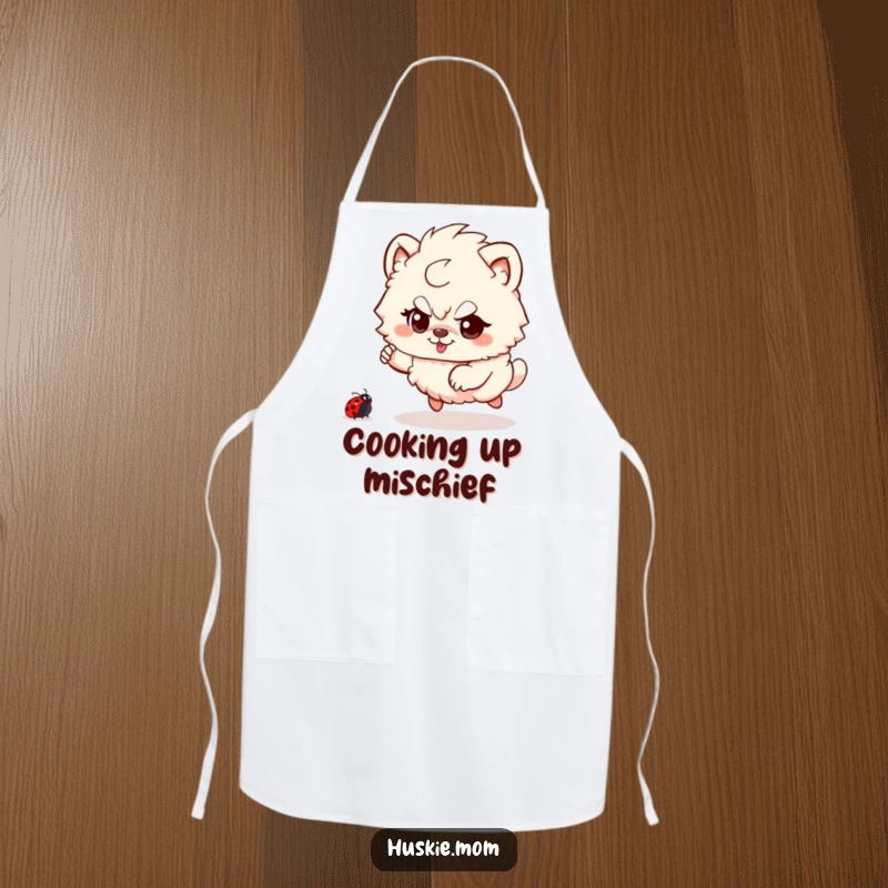 Funny Fluffy Animal Apron: A cute creature playfully chasing a ladybug while cooking, bringing humor and fun to the kitchen.