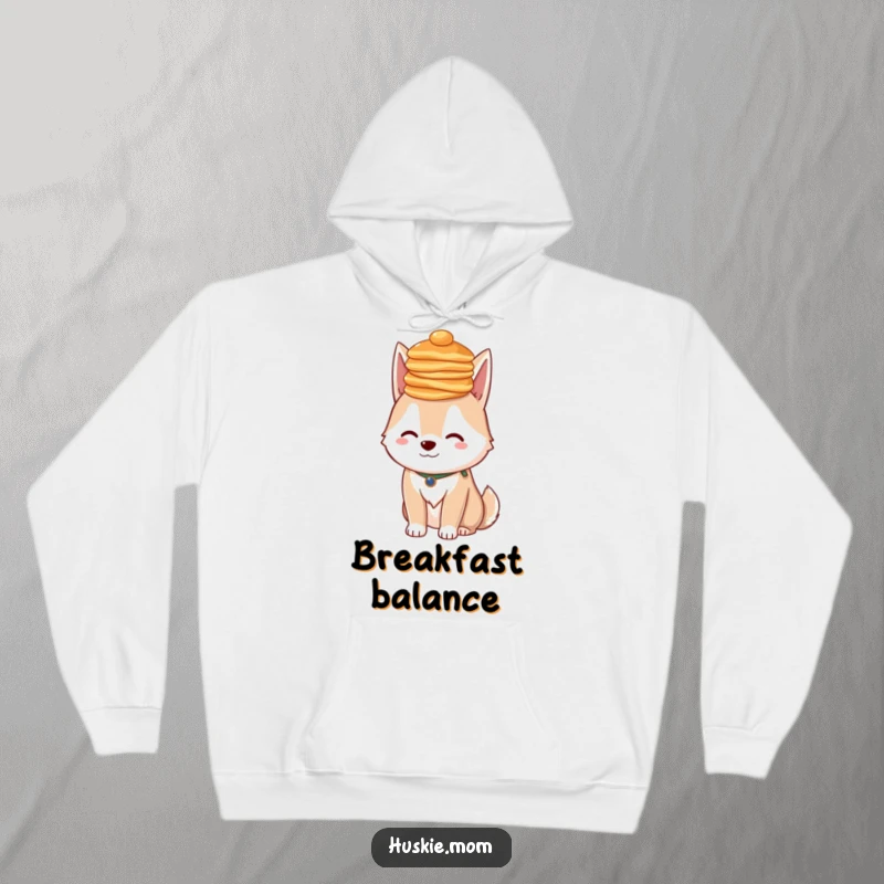 Funny Husky Pancakes Hoodie: A warm sweatshirt with a fluffy dog balancing pancakes, a cozy funny gift.