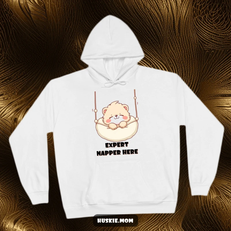 Funny Hoodie: A fluffy animal with a playful grin sleeping peacefully in a suspended bed, embodying ultimate comfort.