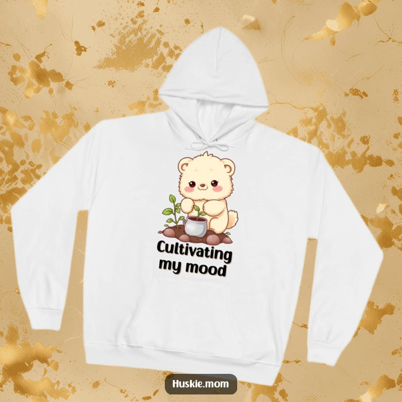 Funny Hoodie: A fluffy animal with rosy cheeks carefully watering a sprouting plant, embodying gentle care.