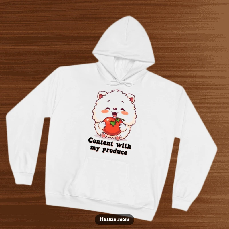 Funny hoodie depicting a fluffy animal blissfully patting a ripe tomato, ideal for cozy garden lovers.