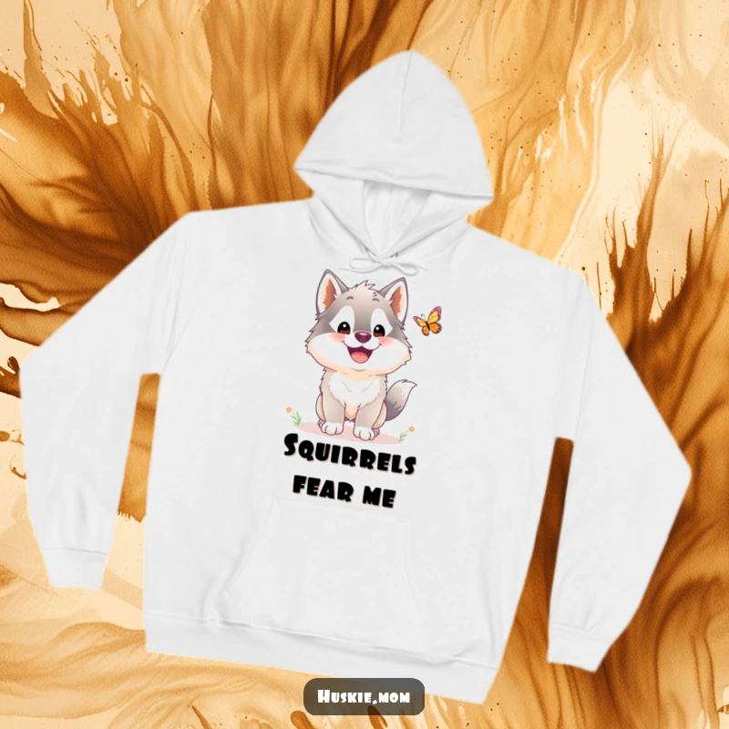 Funny Husky Hoodie: A smiling, fluffy husky excitedly chases a butterfly, capturing a moment of pure, playful bliss.