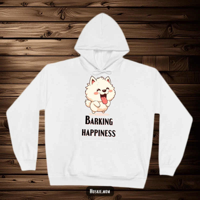 Funny hoodie with a fluffy animal leaping joyfully with its tongue out and a happy bark, perfect for cozy, energetic moments.