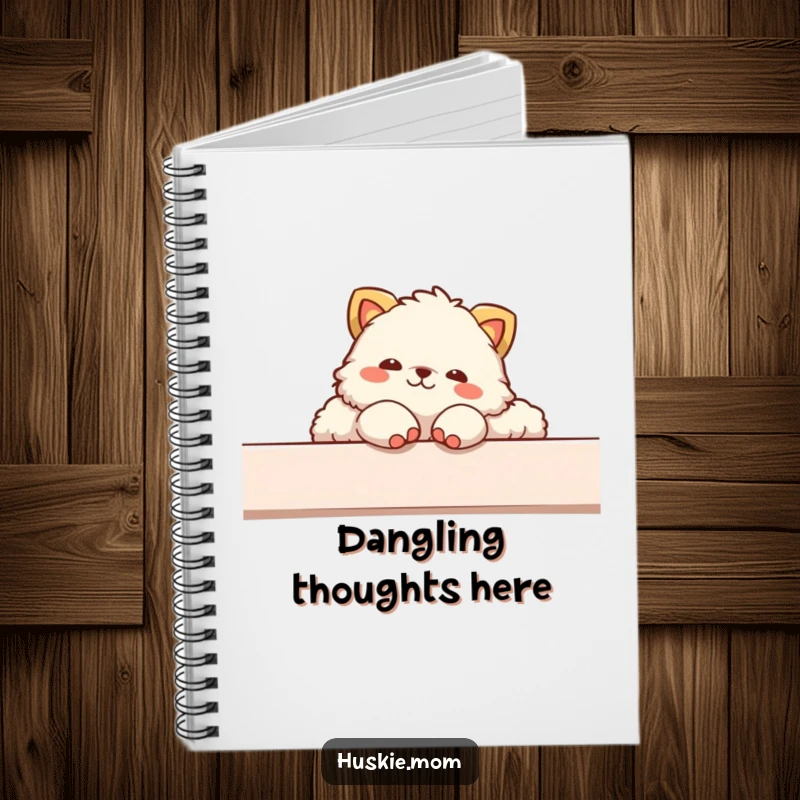 Funny notebook showcasing a fluffy animal in a relaxed lounging pose, paws dangling over the edge, inviting peaceful thoughts.