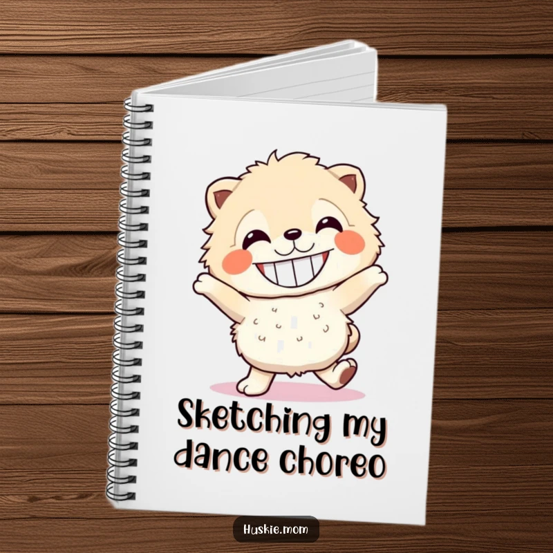 Funny fluffy dancer notebook with a grinning creature dancing, ideal for writing and as a humorous gift.
