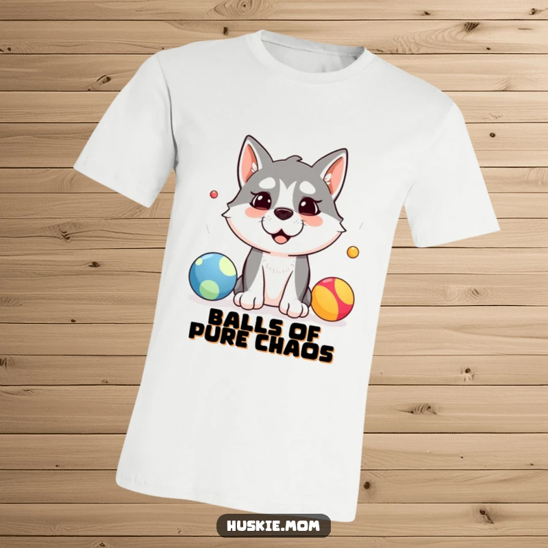 Funny t-shirt with a silly husky dog trying its best to juggle three colorful balls, showcasing determination and humor.