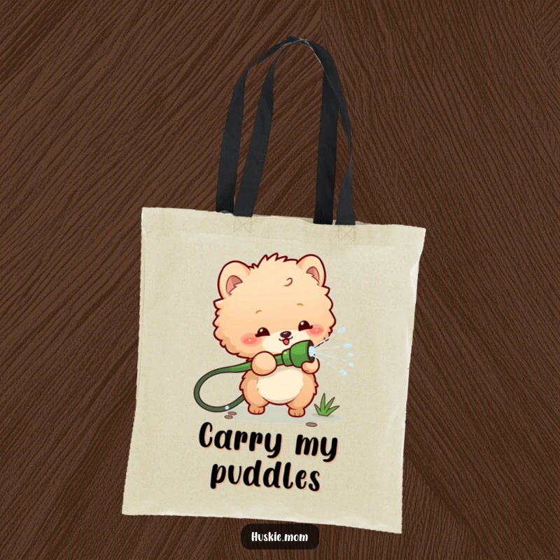 Funny tote bag featuring a fluffy animal gleefully spraying water from a garden hose, perfect for adding humor and practicality to daily use.