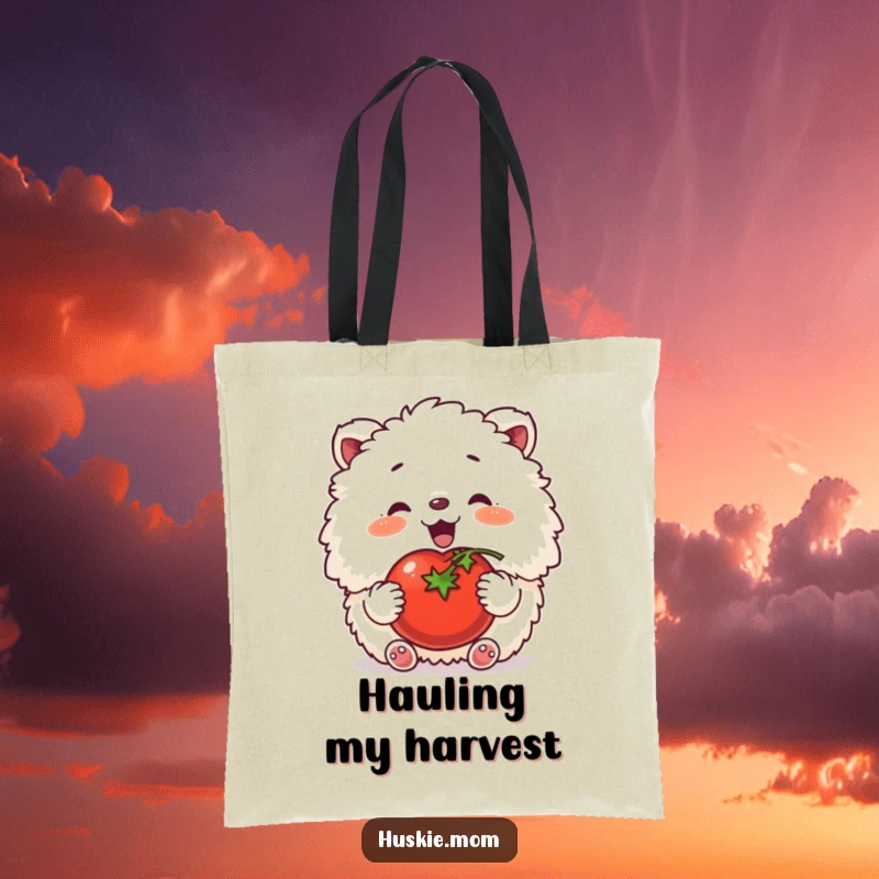 Funny tote bag with a fluffy animal happily patting a tomato, carrying essentials with garden-themed humor.