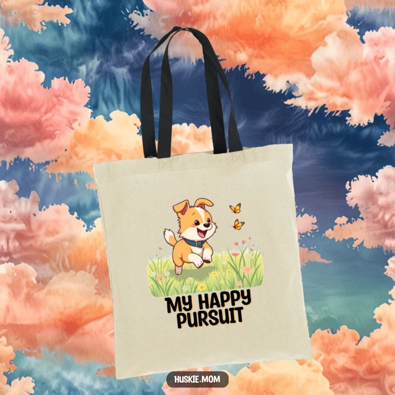Funny dog excitedly chasing a butterfly in a meadow on a durable tote bag, ideal for carrying outdoor gear.