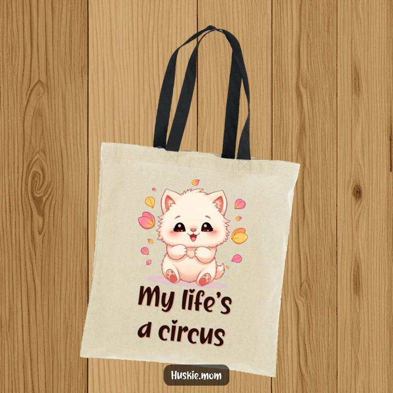 Funny tote bag illustrating a fluffy animal with delighted eyes, performing a petal-juggling act with its nimble paws.
